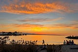 An orange and blue sunset against the Puget Sound.