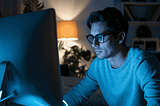 Man on a laptop at night — My AI workflow is breaking profit records again