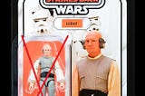 Carded action figure with a plastic Blister crossed out.
