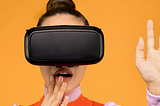 woman in long sleeve shirt surprised in virtual reality