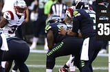 Seattle Seahawks barely survive with a huge goal-line stop against the New England Patriots.