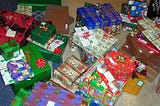 A bunch of wrapped Christmas gifts
