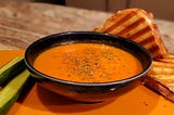 A Croque Monsieur with Tomato-Pepper Bisque, cooked by the author on a dreary day.