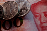 China’s Surprise Rate Cut: Balancing Stimulus Amid Yuan Concerns