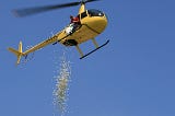 Ping-Pong balls being dropped out of a helicopter.