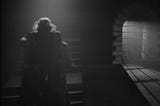 Shot of The Beast carrying Beauty upstairs in Jean Cocteau’s 1946 fantasy