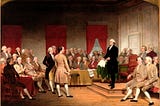 The painting “Washington as Statesman at the Constitutional Convention” by Junius Brutus Stearns depicts George Washington presiding over the 1787 Constitutional Convention in Philadelphia. Washington, dressed in black, stands on a raised platform, holding a draft of the proposed federal constitution as he urges its passage. Surrounding him are delegates in 18th-century attire, engaged in discussion, listening intently, or writing.