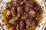 Slow-Cooked, Spice-Infused Lamb in the Heart of Marrakech