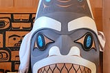 A white and grey mask for traditional Haida ceremonies