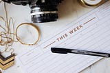 Weekly Calendar with pen — Photo by Jazmin Quaynor on Unsplash