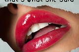 red lips open, showing teeth with caption “That’s what she said”