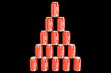 A pyramid of cola cans