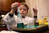 A child doing chemistry
