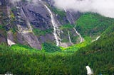 Sailing into a Sacred Chamber of Waterfalls