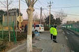 Police guarding the entrance of a funeral home in Miyun, in Beijing, in late December. They reportedly turned away reporters who went to talk to relatives of people who died of Covid.