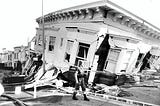 A soldier patrols in front of a destroyed apartment building in SF’s Marina district after the 1989 Loma Prieta earthquake, which destroyed 35 buildings in the neighborhood and thousands more across the Bay Area.