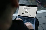 Viewing the SumUp website on a laptop, highlighting tools for small businesses, including payment systems and financial management solutions. Photo by SumUp on Unsplash