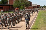 Military recruits marching in formation during basic training