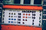 an antique jackpot slot console