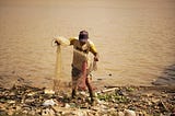 The Batanghari River Story: The Man With The Fishing Net