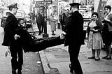 Congressman John Lewis being carried away by police after a sit in. Nashville TN circa 1960s