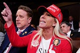 House of Representatives’ Marjorie Taylor Greene of Georgia dressed like she is selling popcorn at a monster truck rally sponsored by the Ku Klux Klan.