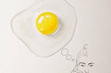 A person with a thought bubble taking the shape of a fried egg