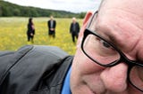 Singer Robert Lloyd and members of The Nightingales in the background.