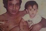 This is me and my dad circa 1984. I was about 8 months old.