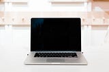 A silver laptop on a desk