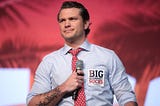 A photo of Secretary Pete Hegseth giving a speech