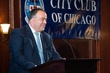 Assessor Fritz Kaegi at the podium delivering speech to the City Club of Chicago.