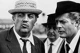 Photo: Italian director Federico Fellini (left) and actor Marcello Mastroianni (right)