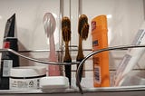 Photo of three toothbrushes in the author’s bathroom.