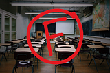 Red F with circle over image of classroom with empty desks