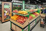 Grocery store fruit display full of apples