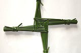 Bridget’s cross woven of green reed.