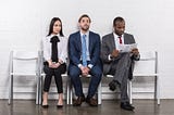 Source: https://depositphotos.com/184229582/stock-photo-multiethnic-young-business-people-waiting.html