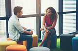 young man and woman having a conversation