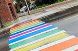 Guerilla Urbanism leads to Painted with Pride Crosswalks in Grand Rapids, Michigan.