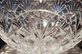 A crystal glass serving bowl.