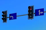 Two stop lights, one for turning left and one for going straight.