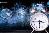 An illustration of a silver alarm clock with blue fireworks in the background. Also included are the Salesforce Labs and AppExchange logos.