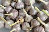 Recently pared new crop of garlic.