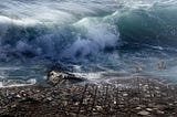 A huge tsunami engulfs a coastal city