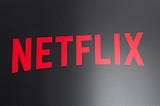 Why did Netflix drop its prices in Indonesia?