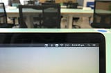 Laptop screen showing 6.37pm