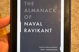 The photograph of the book “The Almanack of Naval Ravikant”