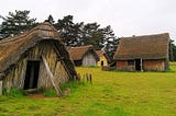 Replica Anglo-Saxon homes in a field at West Stow, England