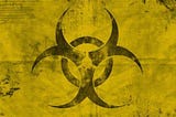 Biohazard symbol on a dusty yellow background.